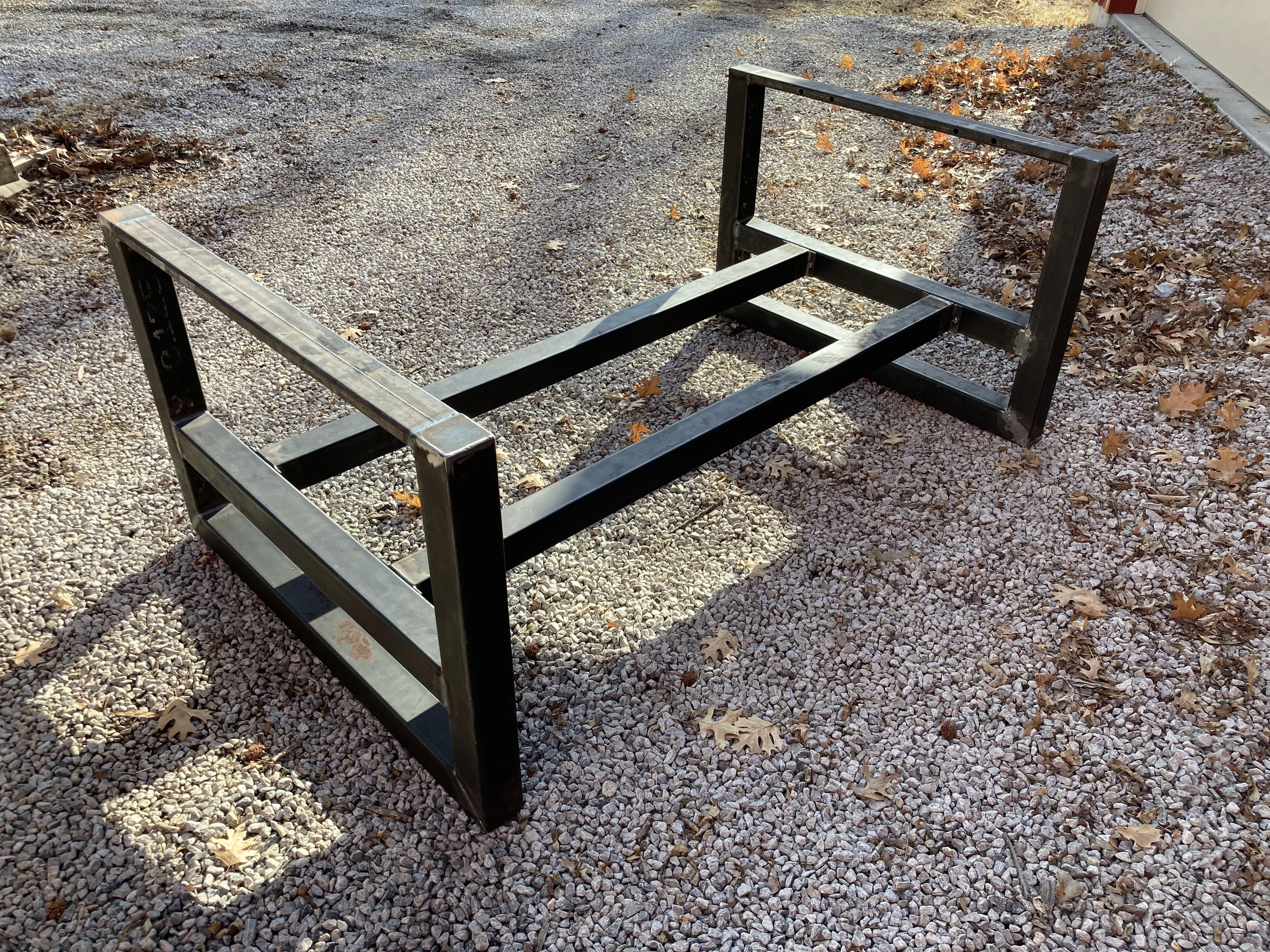 Custom fabricated steel table base